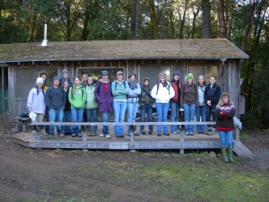 Class on front porch of Fox Creek pavillion; cabins are just to the left of this picture